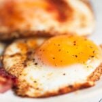 a close up of a paprika fried egg