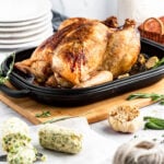 whole roast chicken in a cast iron pan