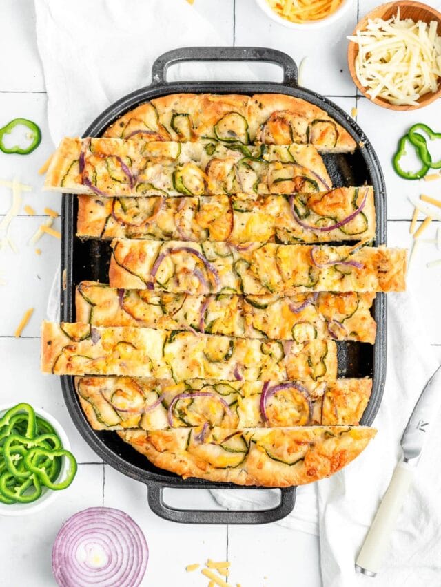 onion and pepper focaccia cut into strips.