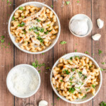 two bowls of garlic parmesan chicken pasta