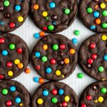 chocolate m&m cookies in a three by three grid