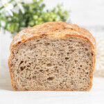 cross section of a loaf of deli rye sandwich bread