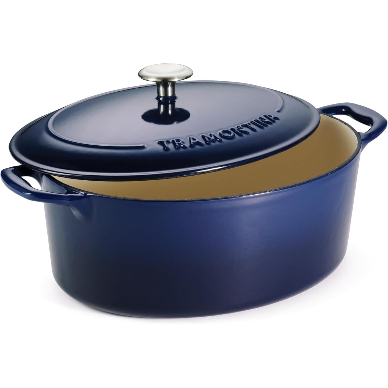 A blue enameled cast iron Dutch oven with handles and a metal knob on the lid, partially open to show the light-colored interior. The brand name Tramontina is embossed on the lid.