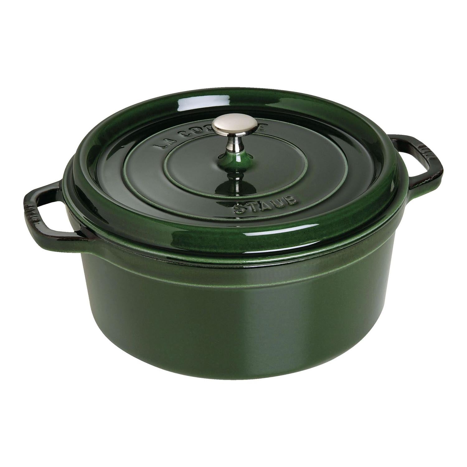 A green enameled cast iron Dutch oven with two side handles and a round lid featuring a metal knob. The lid is embossed with the brand name “Staub” and “La Cocotte.”.