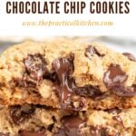 Close-up of thick peanut butter oatmeal chocolate chip cookies with melted chocolate chips oozing out, highlighting the irresistible texture of classic peanut butter cookies. The website thepracticalkitchen.com is written above the cookies.